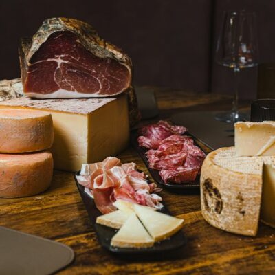 Selection of artisanal cheeses and cured meats, Casentino ham grey